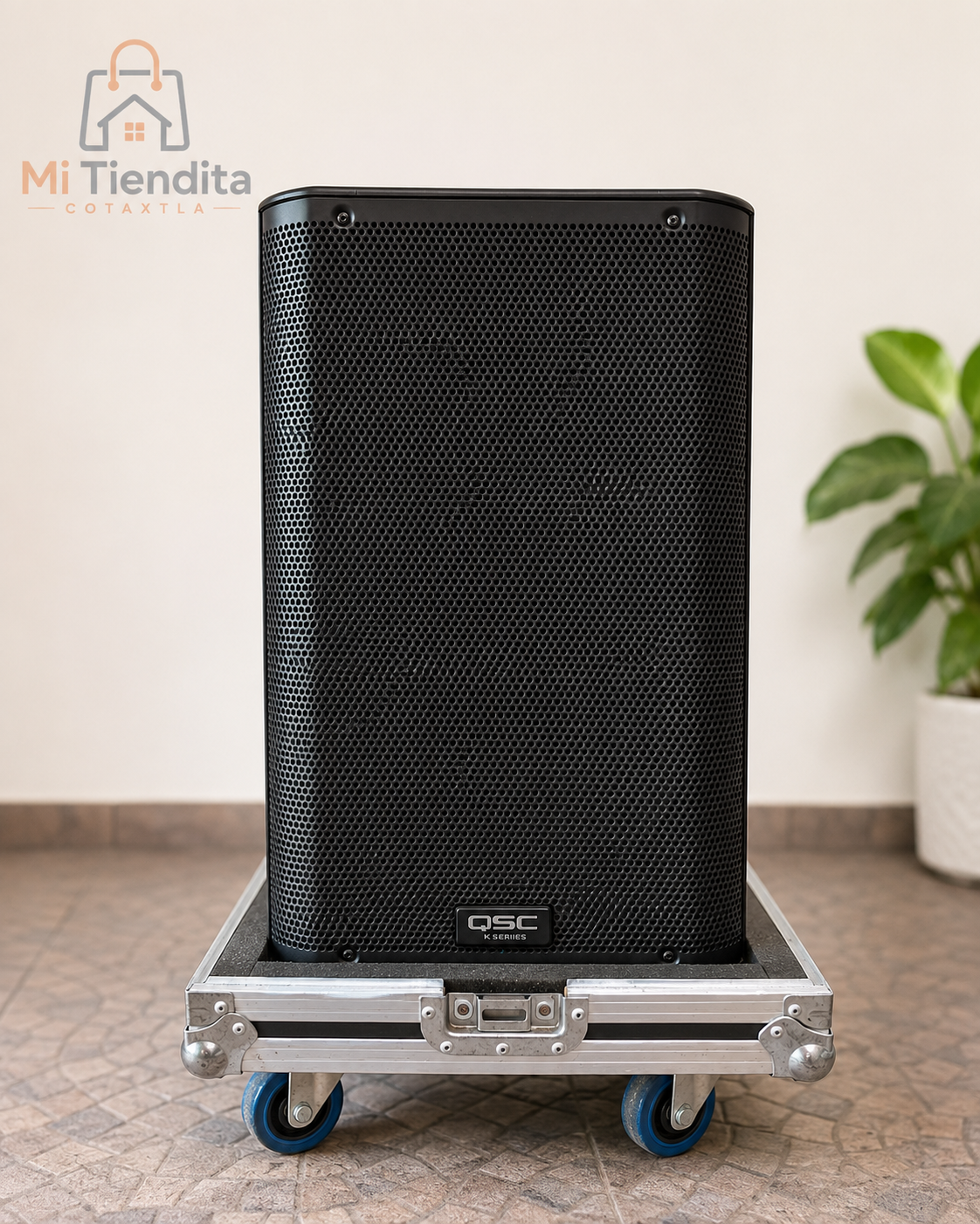 Paquete profesional de audio QSC con consola y accesorios